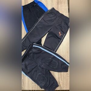 Puma Kids Black Joggers with Blue and Orange Details